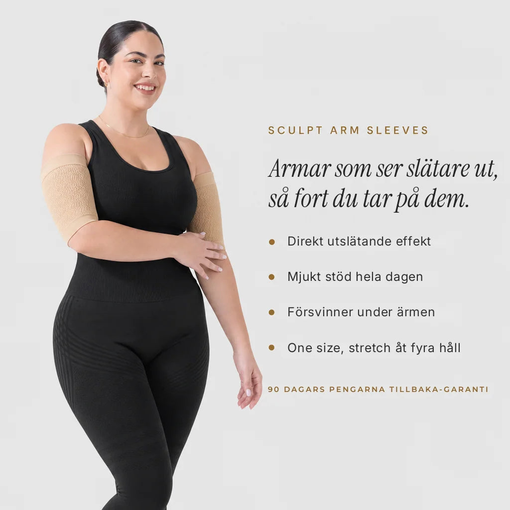 Kvinna i svarta Sculpt™ kompressionsärmar och svart linne